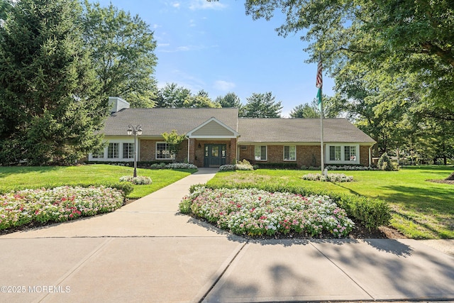 33 Honeysuckle Ln Unit 194, Red Bank, NJ 07701 - single story home featuring french doors, a front lawn, and brick siding