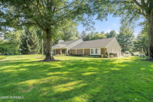 33 Honeysuckle Ln Unit 194, Red Bank, NJ 07701 - ranch-style house with a front yard, brick siding, and a chimney
