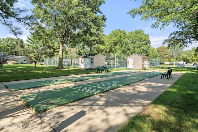 33 Honeysuckle Ln Unit 194, Red Bank, NJ 07701 - surrounding community with shuffleboard and a shed