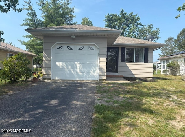 101 Bonaire Dr, Toms River, NJ 08757 - single story home with driveway, an attached garage, a front yard, and a shingled roof