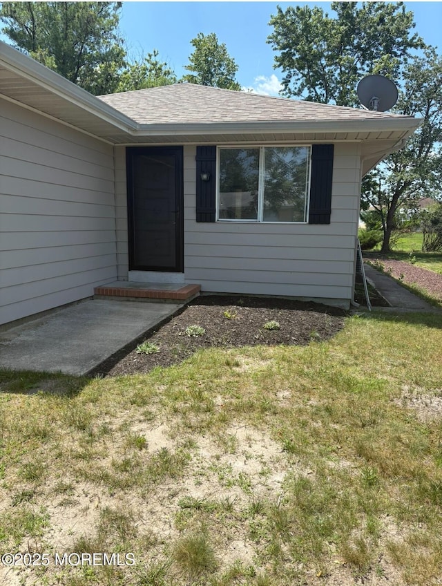 101 Bonaire Dr, Toms River, NJ 08757 - doorway to property with a yard