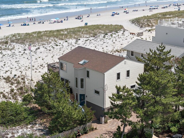 208 E 20th St, Long Beach Twp, NJ 08008 - aerial view of property and surrounding area featuring waterfront with a beach