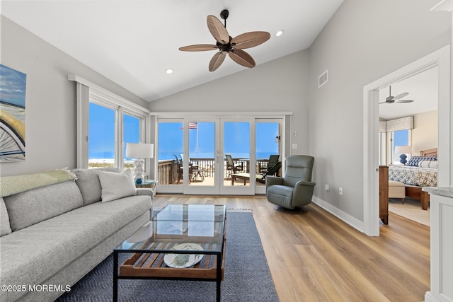208 E 20th St, Long Beach Twp, NJ 08008 - living room featuring ceiling fan, light wood-style flooring, high vaulted ceiling, and recessed lighting