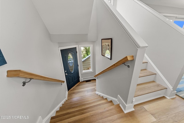 208 E 20th St, Long Beach Twp, NJ 08008 - stairs with wood finished floors, healthy amount of natural light, and baseboard heating
