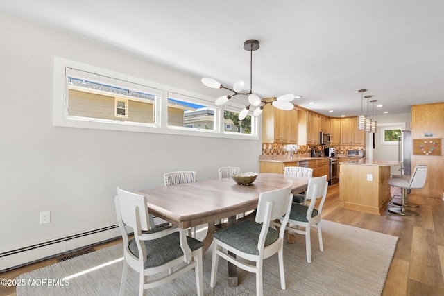 208 E 20th St, Long Beach Twp, NJ 08008 - dining space with a chandelier, light wood-style flooring, and recessed lighting
