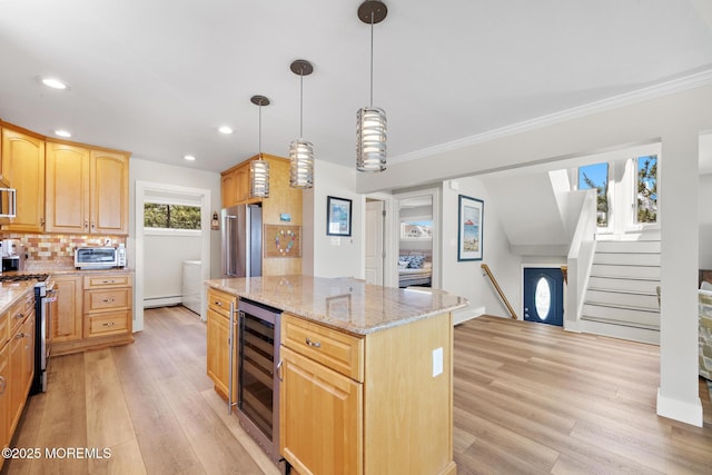 208 E 20th St, Long Beach Twp, NJ 08008 - kitchen with beverage cooler, stainless steel appliances, light wood-style floors, light stone counters, and recessed lighting