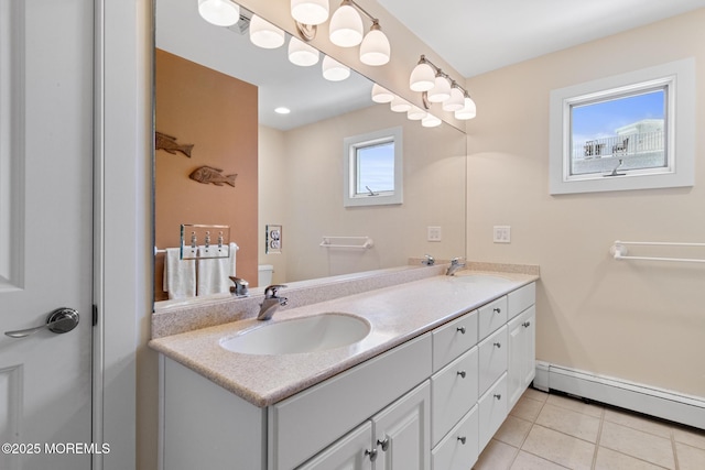 208 E 20th St, Long Beach Twp, NJ 08008 - full bathroom with a baseboard radiator, double vanity, and tile patterned flooring