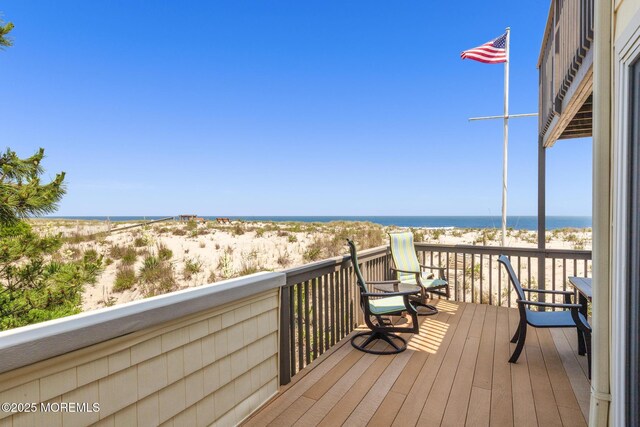 208 E 20th St, Long Beach Twp, NJ 08008 - deck featuring view of water and beach