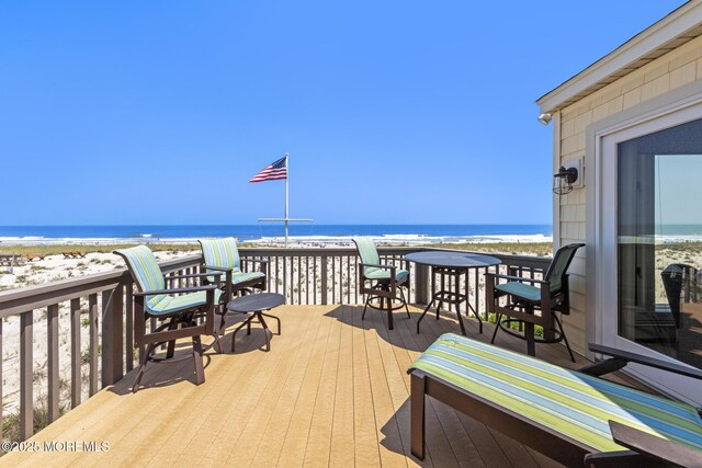 208 E 20th St, Long Beach Twp, NJ 08008 - wooden deck featuring view of water and beach