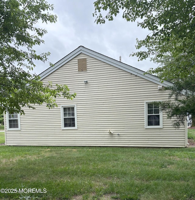 2009 Brookdale Dr, Forked River, NJ 08731 - view of property exterior with a yard