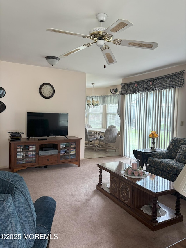 2009 Brookdale Dr, Forked River, NJ 08731 - living area with healthy amount of natural light, carpet flooring, and a ceiling fan