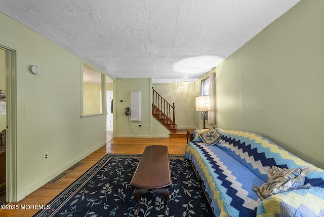17 Wood Ave, Englishtown, NJ 07726 - staircase with wood finished floors and a textured ceiling