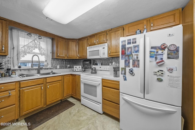 17 Wood Ave, Englishtown, NJ 07726 - kitchen featuring white appliances, light countertops, and brown cabinetry