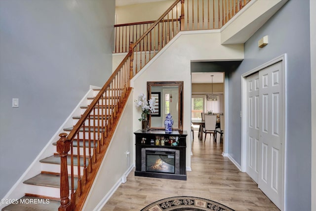1041 Aumack Rd, Jackson, NJ 08527 - staircase featuring a high ceiling and wood finished floors