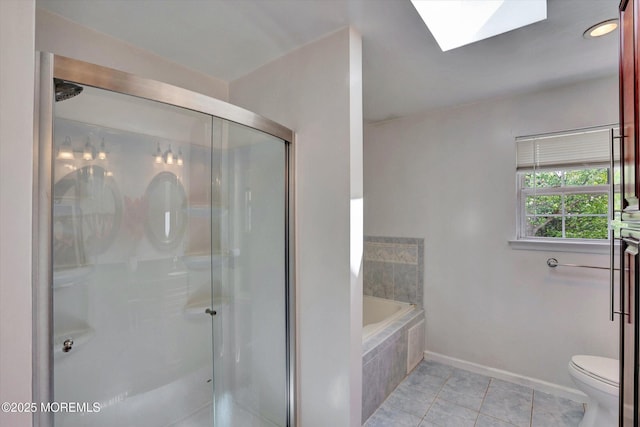 1041 Aumack Rd, Jackson, NJ 08527 - bathroom with a stall shower, a skylight, tile patterned flooring, and a garden tub