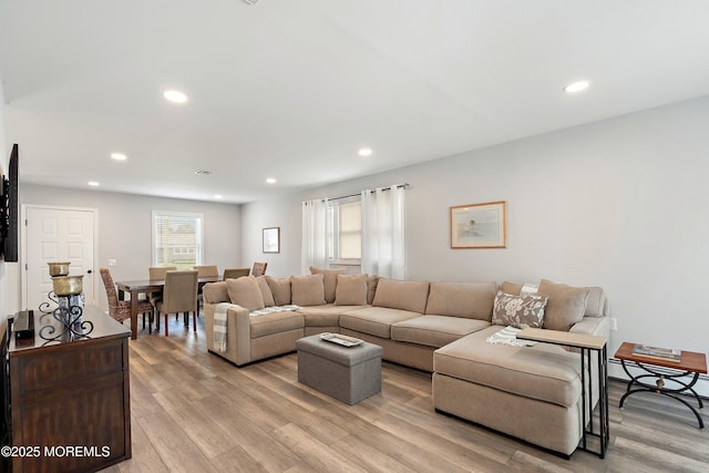 9 Maniwaki Ct, Toms River, NJ 08757 - living area with light wood finished floors, recessed lighting, and a baseboard radiator