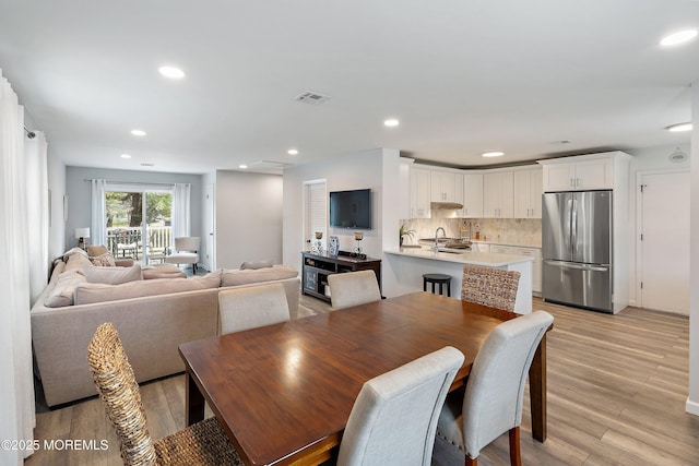 9 Maniwaki Ct, Toms River, NJ 08757 - dining area featuring light wood-style floors and recessed lighting