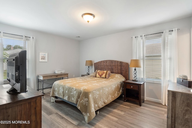 9 Maniwaki Ct, Toms River, NJ 08757 - bedroom with light wood-style floors