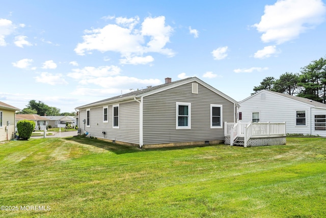 9 Maniwaki Ct, Toms River, NJ 08757 - back of house featuring a wooden deck, a yard, and crawl space