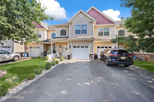 100 Pine St Unit 9, Lakehurst, NJ 08733 - multi unit property featuring driveway, an attached garage, a front yard, and stone siding