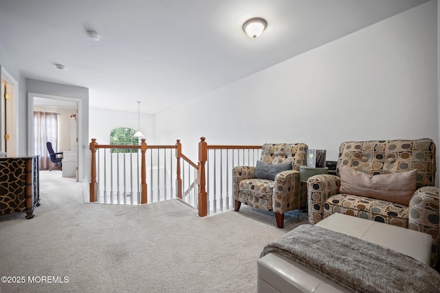 100 Pine St Unit 9, Lakehurst, NJ 08733 - living area featuring carpet floors and an upstairs landing