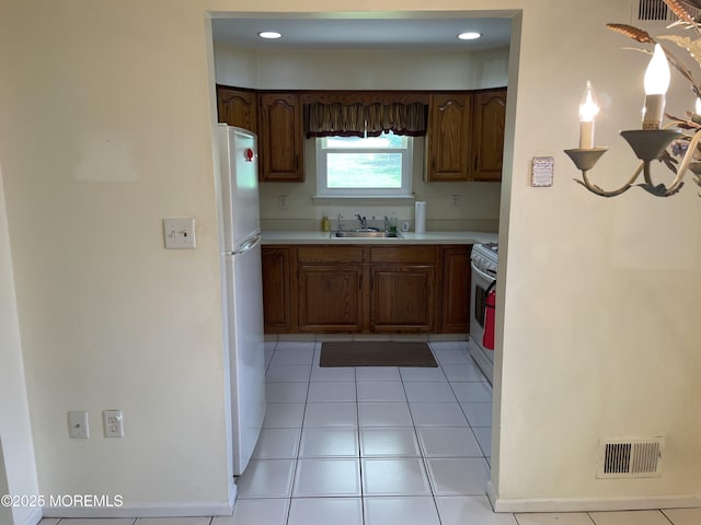 14 Weston Ct, Marlboro, NJ 07746 - kitchen featuring white appliances, light countertops, recessed lighting, and light tile patterned floors