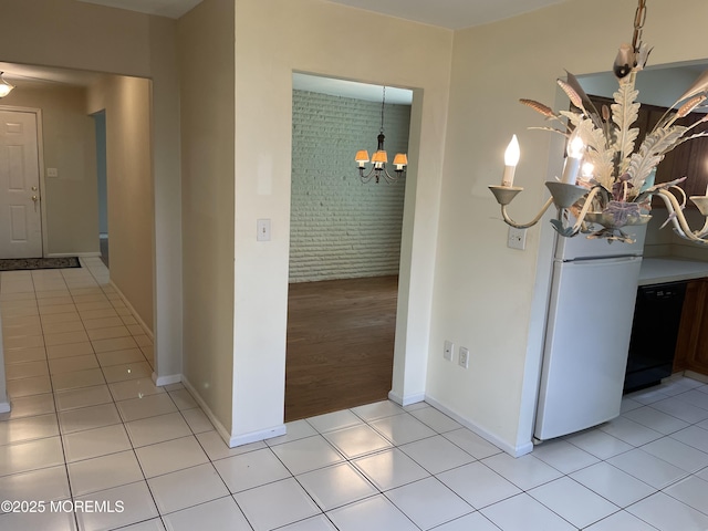 14 Weston Ct, Marlboro, NJ 07746 - hallway featuring a chandelier and light tile patterned floors