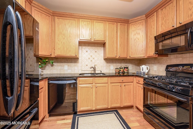203 Canterbury Ln, Morganville, NJ 07751 - kitchen featuring black appliances, backsplash, light wood-style flooring, and dark stone counters