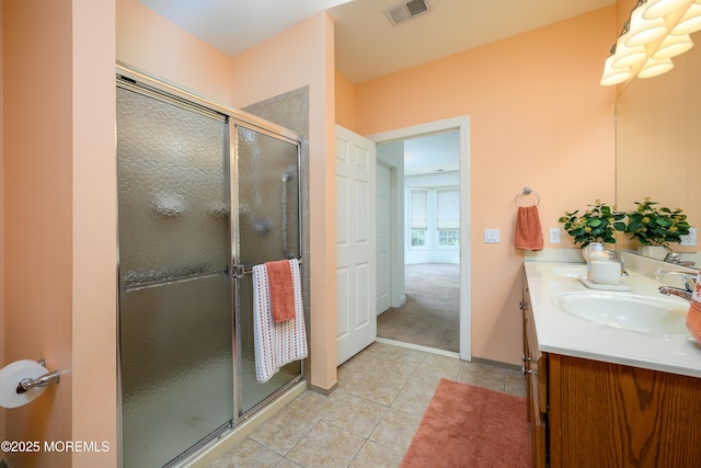 203 Canterbury Ln, Morganville, NJ 07751 - bathroom featuring double vanity, tile patterned flooring, and a stall shower