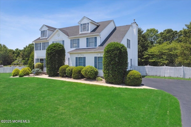 140 Palisade Dr, Freehold, NJ 07728 - view of front facade featuring driveway and a chimney