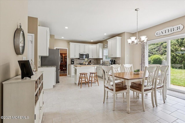 140 Palisade Dr, Freehold, NJ 07728 - dining room featuring a chandelier and recessed lighting