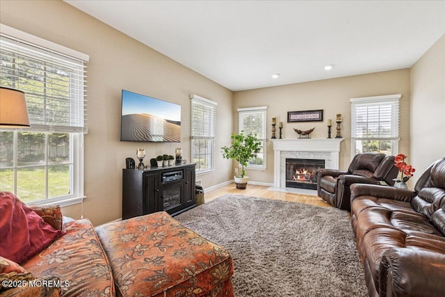 140 Palisade Dr, Freehold, NJ 07728 - living area with a fireplace, plenty of natural light, wood finished floors, and recessed lighting