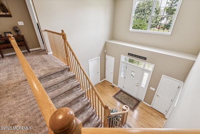 140 Palisade Dr, Freehold, NJ 07728 - foyer featuring a towering ceiling and wood finished floors