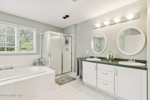 140 Palisade Dr, Freehold, NJ 07728 - bathroom featuring a stall shower, a garden tub, double vanity, and tile patterned floors