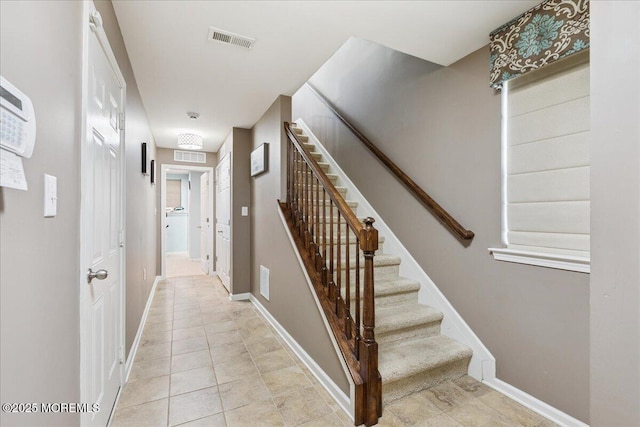 259 Chickadee Ct Unit 1000, Freehold, NJ 07728 - stairway featuring tile patterned floors and baseboards