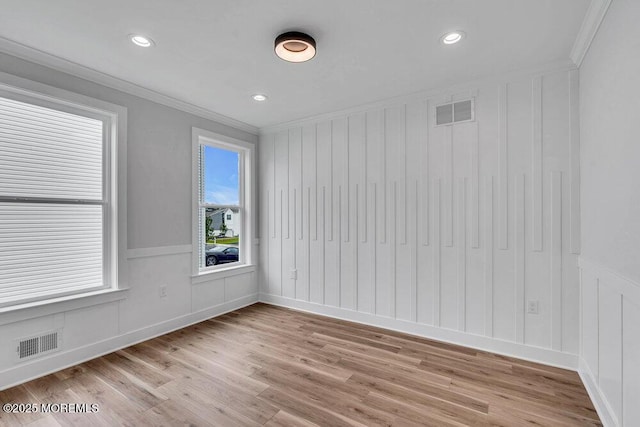 12 Outsail Ave, Barnegat, NJ 08005 - spare room with crown molding, a decorative wall, light wood-style floors, recessed lighting, and a wainscoted wall