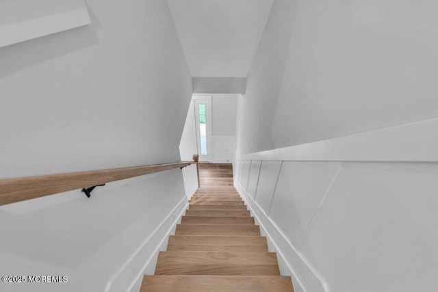 12 Outsail Ave, Barnegat, NJ 08005 - staircase featuring wood finished floors, a wainscoted wall, and vaulted ceiling