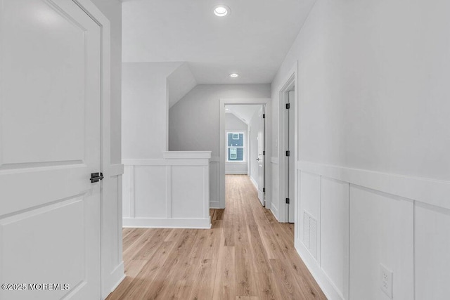 12 Outsail Ave, Barnegat, NJ 08005 - corridor with a decorative wall, light wood finished floors, recessed lighting, vaulted ceiling, and wainscoting