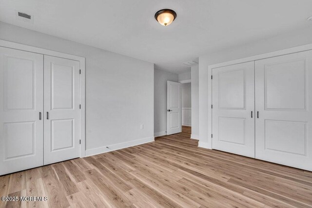 12 Outsail Ave, Barnegat, NJ 08005 - unfurnished bedroom with baseboards and light wood-style flooring