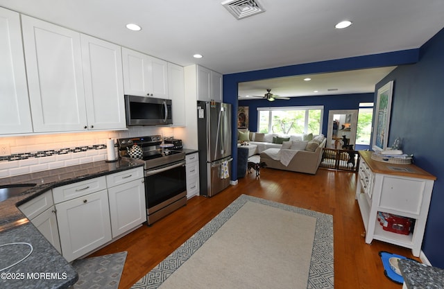 244D Jefferson Ct, Lakewood, NJ 08701 - kitchen featuring stainless steel appliances, tasteful backsplash, dark wood-type flooring, white cabinets, and recessed lighting