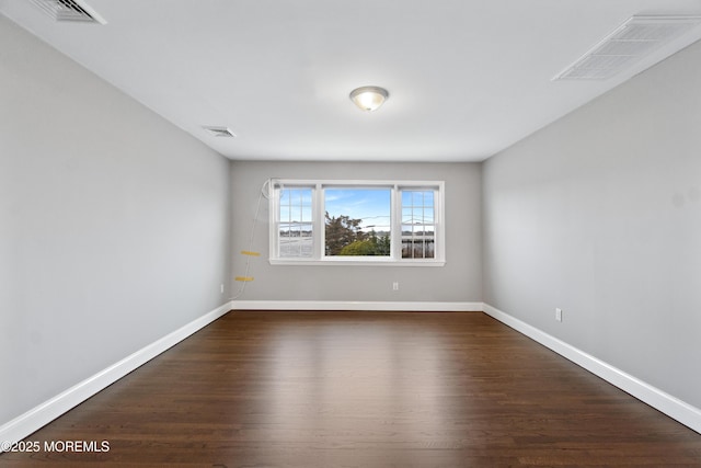 23 Island Dr, Brick, NJ 08724 - empty room with dark wood-style floors