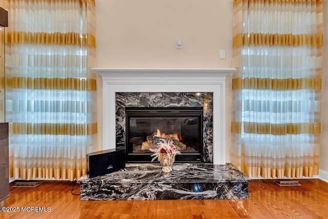 47 Mccormick Ave N, Old Bridge, NJ 08857 - detailed view of a high end fireplace and wood finished floors