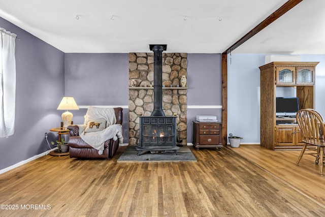 1341 1st Ave, Toms River, NJ 08757 - living area featuring a wood stove and wood finished floors