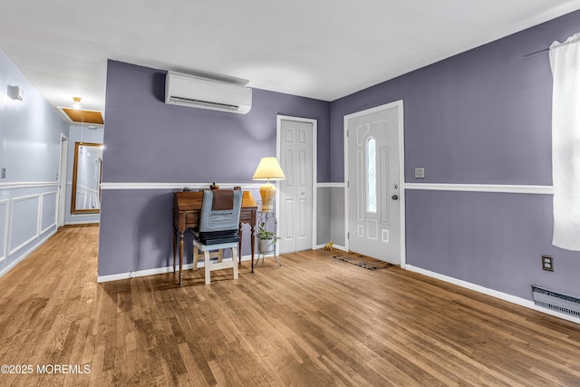 1341 1st Ave, Toms River, NJ 08757 - foyer entrance with a wall mounted AC and wood finished floors