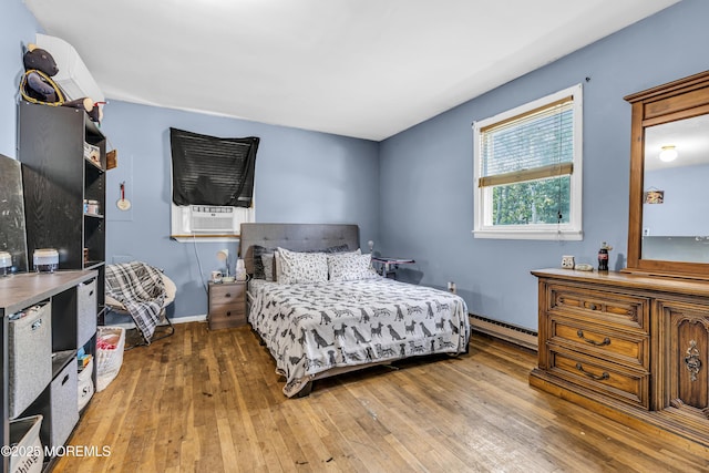 1341 1st Ave, Toms River, NJ 08757 - bedroom with cooling unit, hardwood / wood-style flooring, and baseboard heating