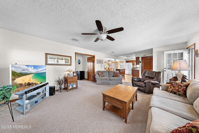 8 Mary Alice Rd, Beach Haven West, NJ 08050 - living area featuring a ceiling fan, light carpet, and a textured ceiling