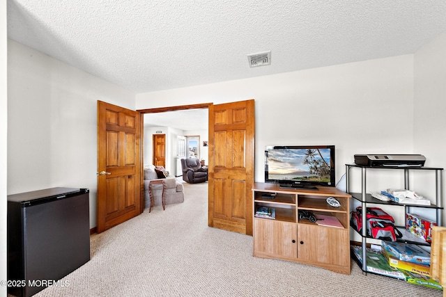 8 Mary Alice Rd, Beach Haven West, NJ 08050 - living room featuring light carpet and a textured ceiling