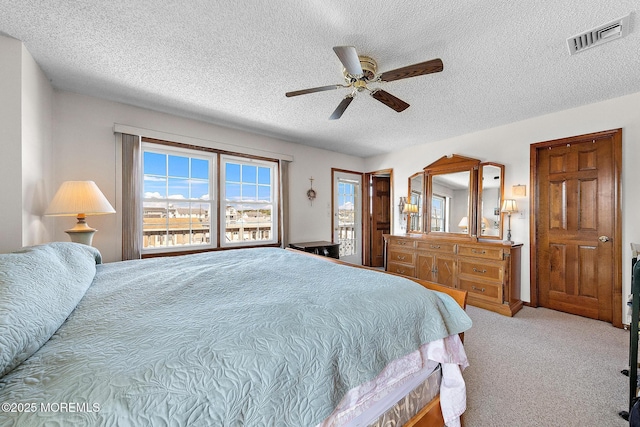 8 Mary Alice Rd, Beach Haven West, NJ 08050 - bedroom featuring a textured ceiling, carpet flooring, ceiling fan, and access to outside