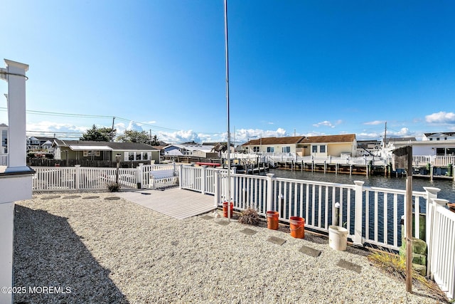 8 Mary Alice Rd, Beach Haven West, NJ 08050 - view of yard featuring a dock, a residential view, and a water view
