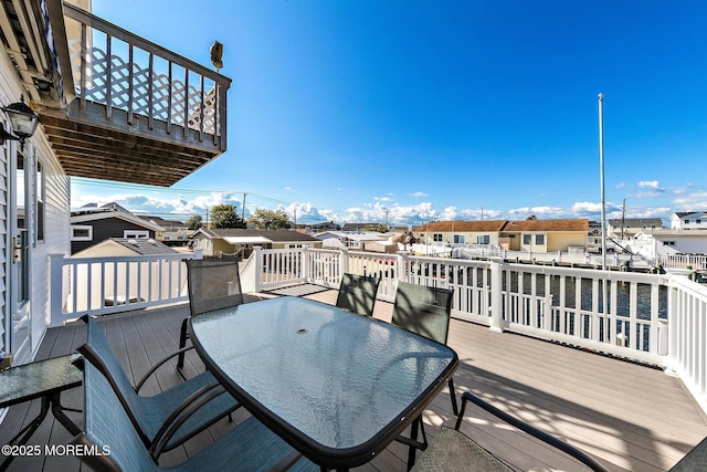8 Mary Alice Rd, Beach Haven West, NJ 08050 - wooden deck featuring outdoor dining space and a residential view